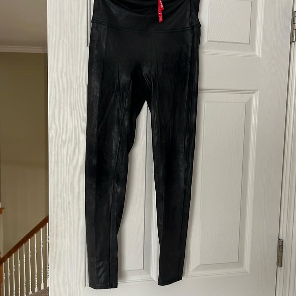 Worn twice leggings from Spanx. Faux leather look.